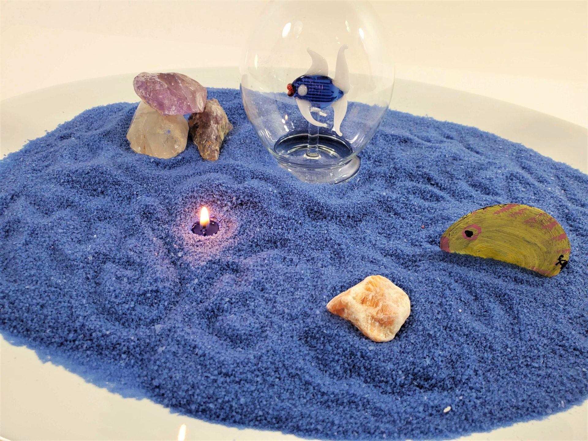 ocean candle with blue candle sand